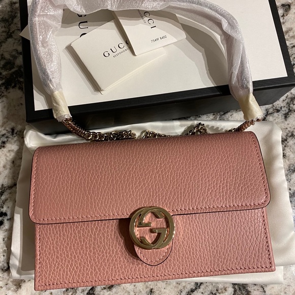 Gucci Handbags - Gucci calfskin interlocking G chain wallet pink